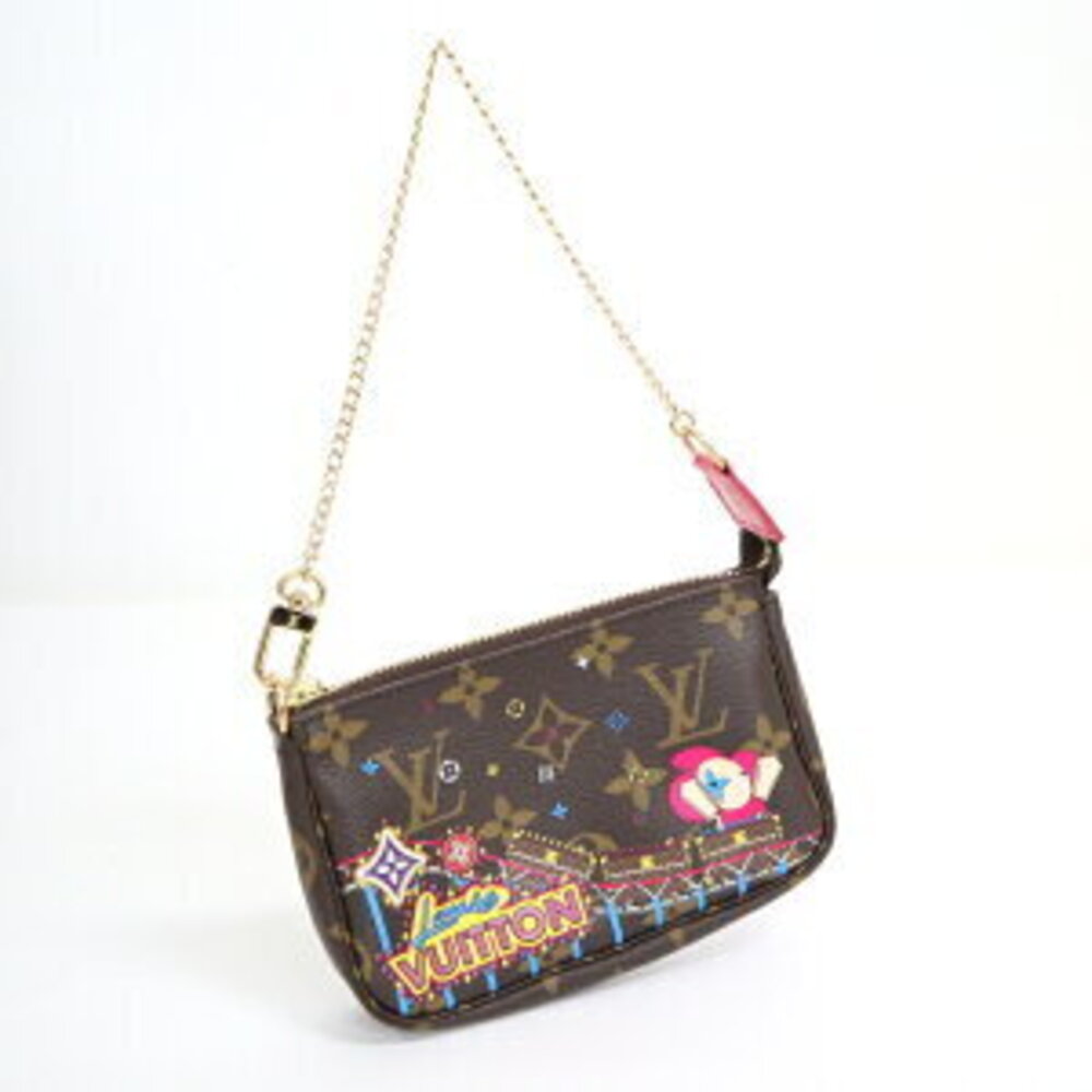 Louis Vuitton limited edition Monogram Christmas Pochette Accessoires Brown